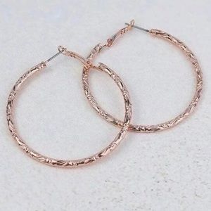 Emery Rose textured metal earrings.